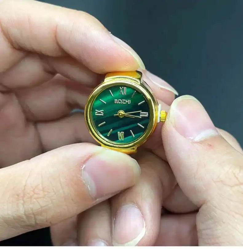 Montre à doigt avec bague et chiffres romains